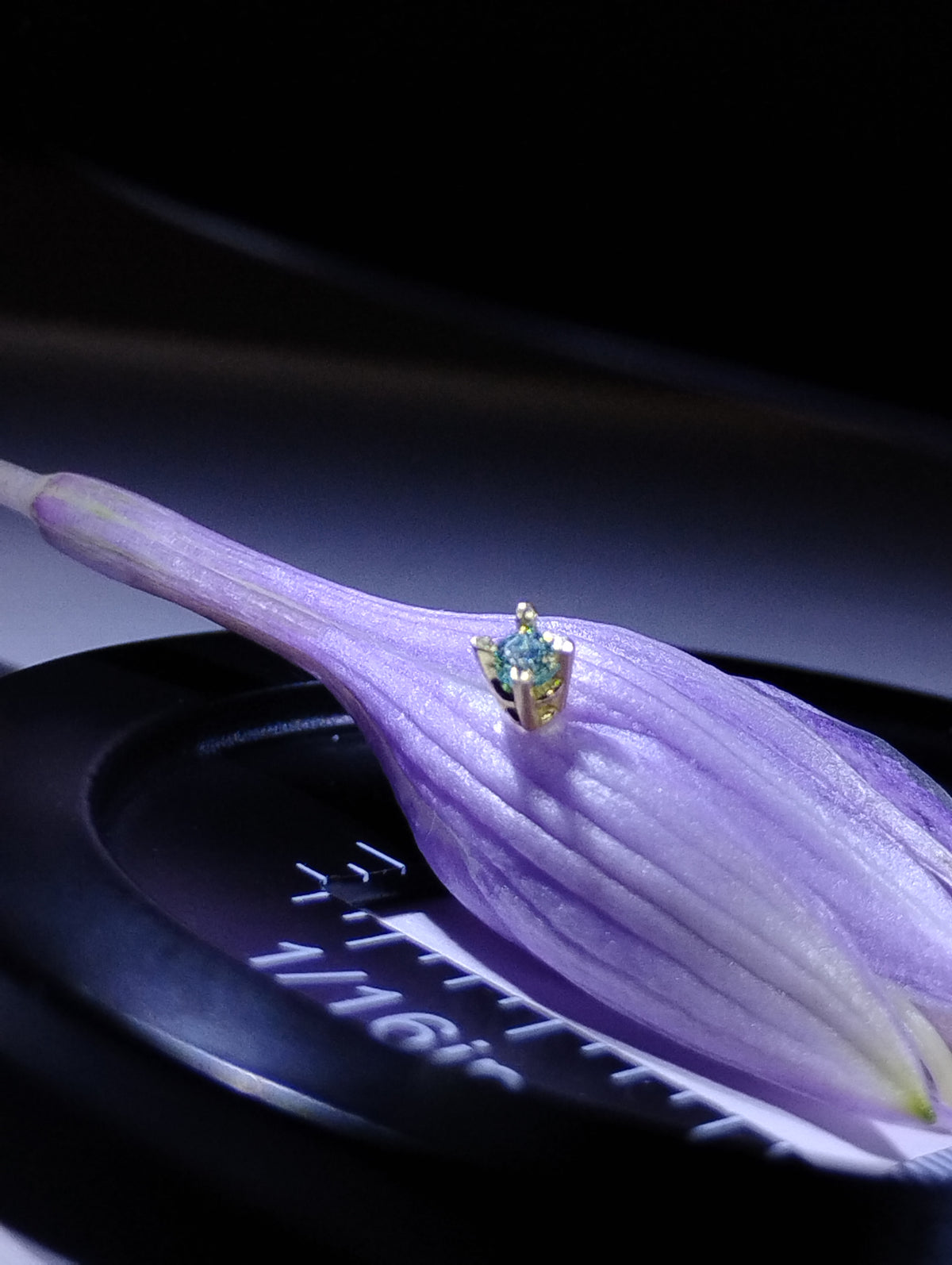 18k solid gold nose ring with 2mm light blue moissanite, body jewelry featuring a sleek, elegant design.