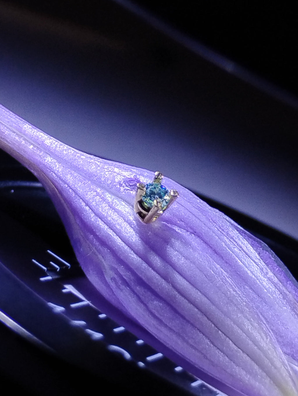 18k solid gold nose ring with 2mm light blue moissanite, body jewelry, designed for a stylish and elegant look.