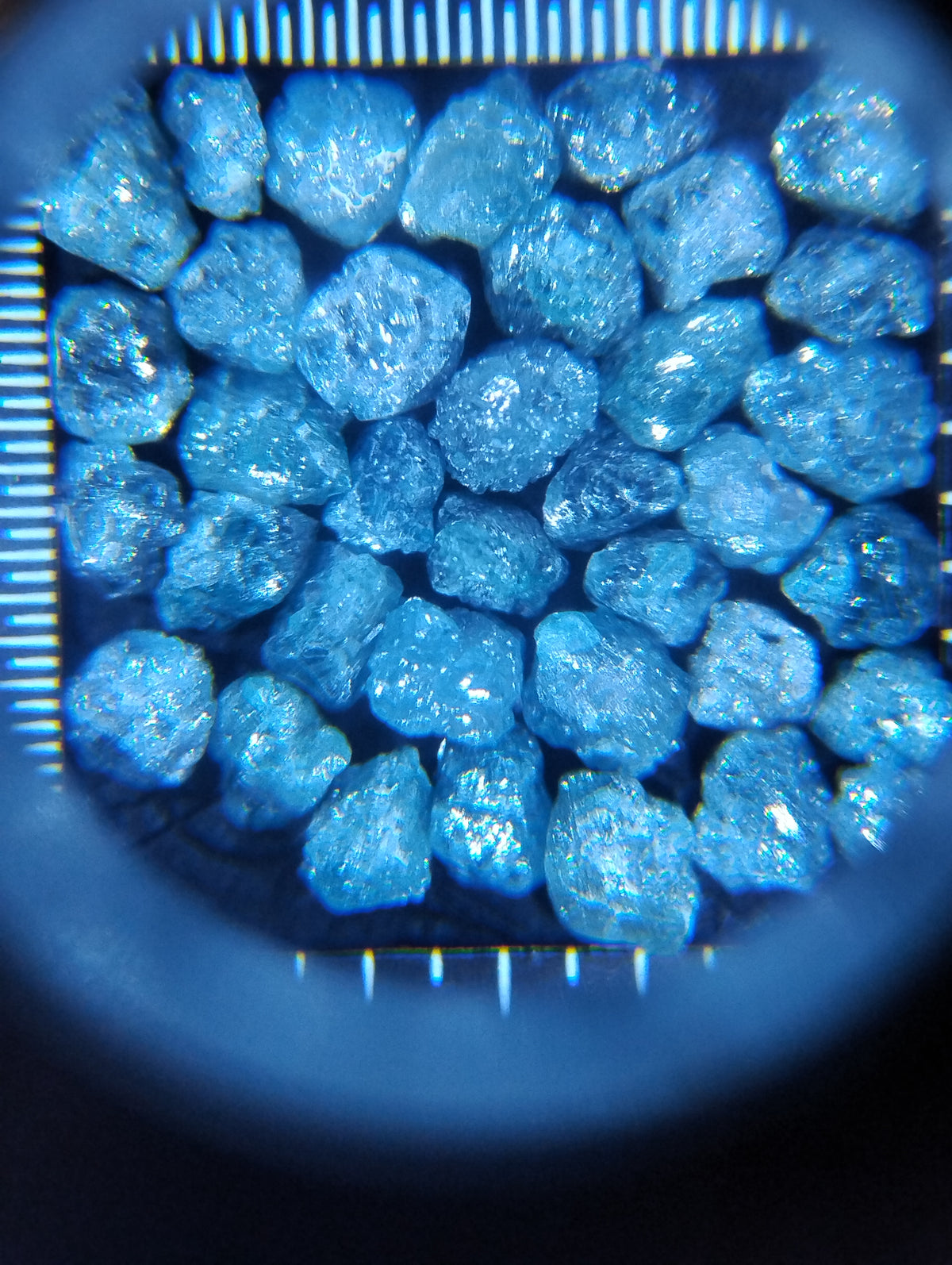 Raw 9-carat natural blue diamonds in loose gemstone lot, showcasing uncut, rough blue gemstone specimens by Rough Diamonds by Mr.