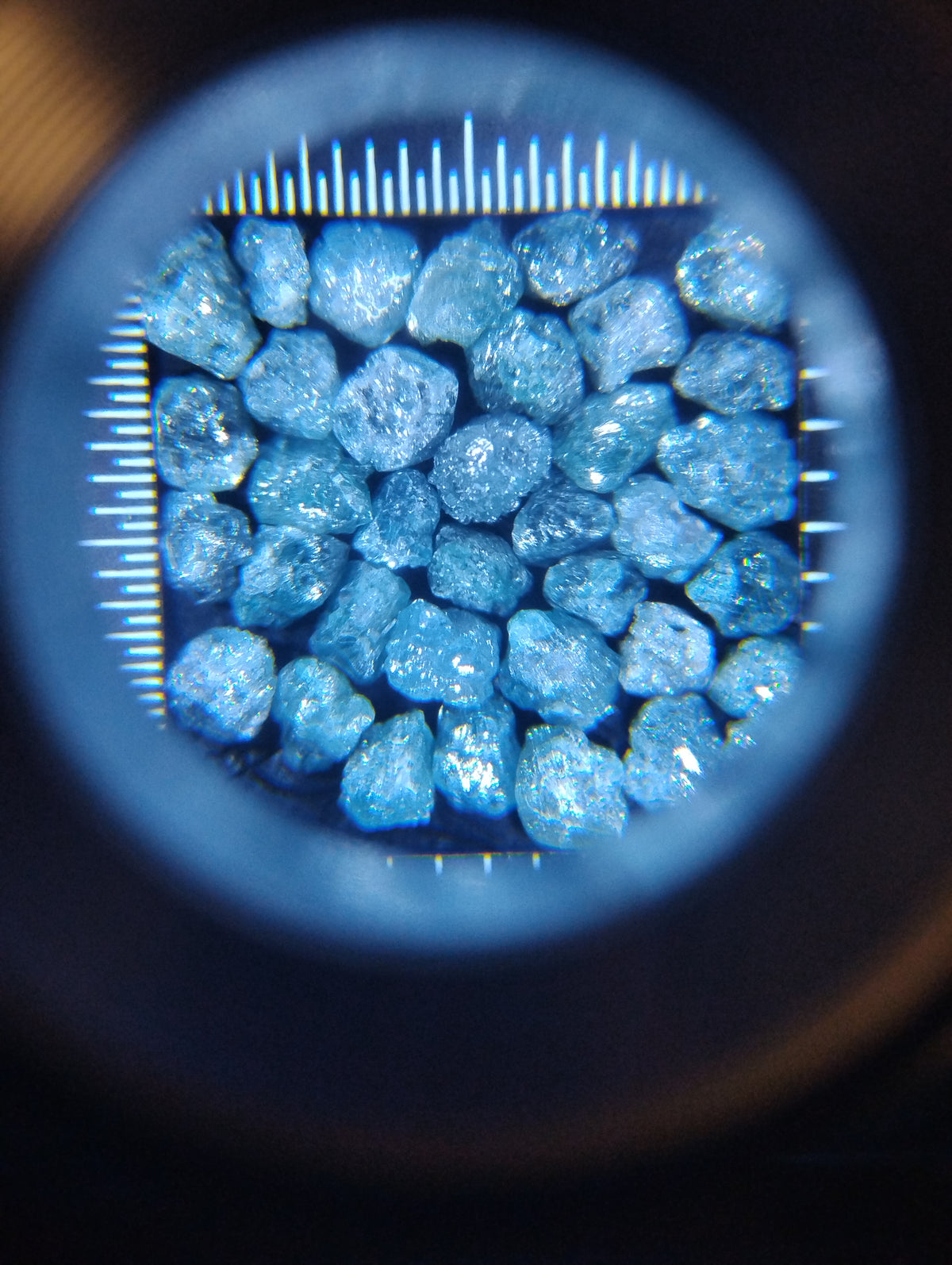 9 cts natural uncut blue diamonds loose gemstones in rough raw lot by Rough Diamonds by Mr, showing unpolished blue diamond stones.