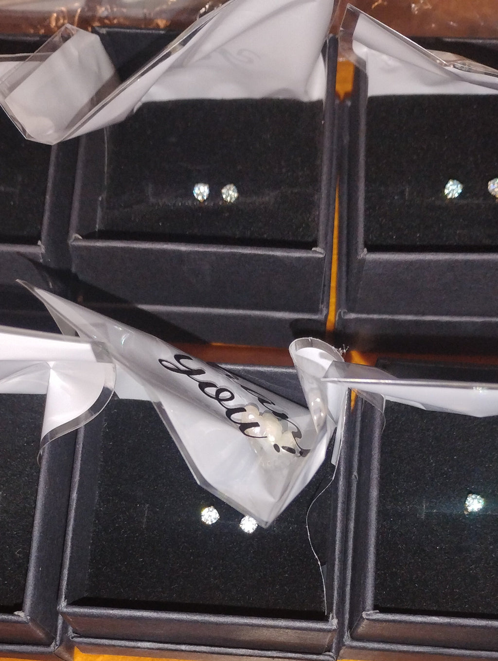 14k gold filled stud earrings with 3mm light blue lab moissanite gemstones, featuring a simple, elegant design.