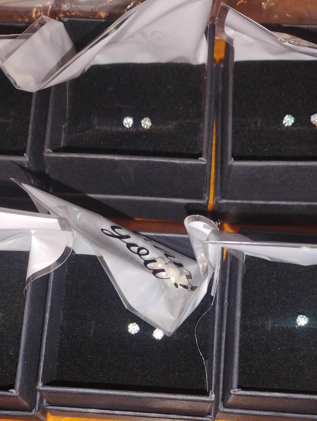 14k gold filled stud earrings with 3mm light blue lab moissanite gemstones, featuring a simple, elegant design.